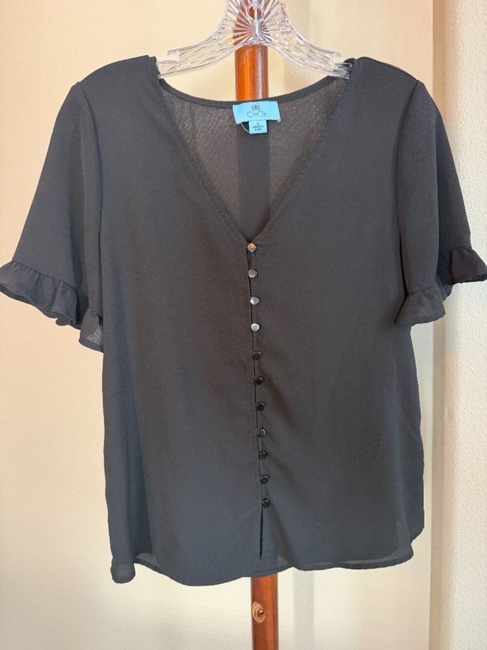 CeCe black blouse with ruffle sleeves and button front, size S